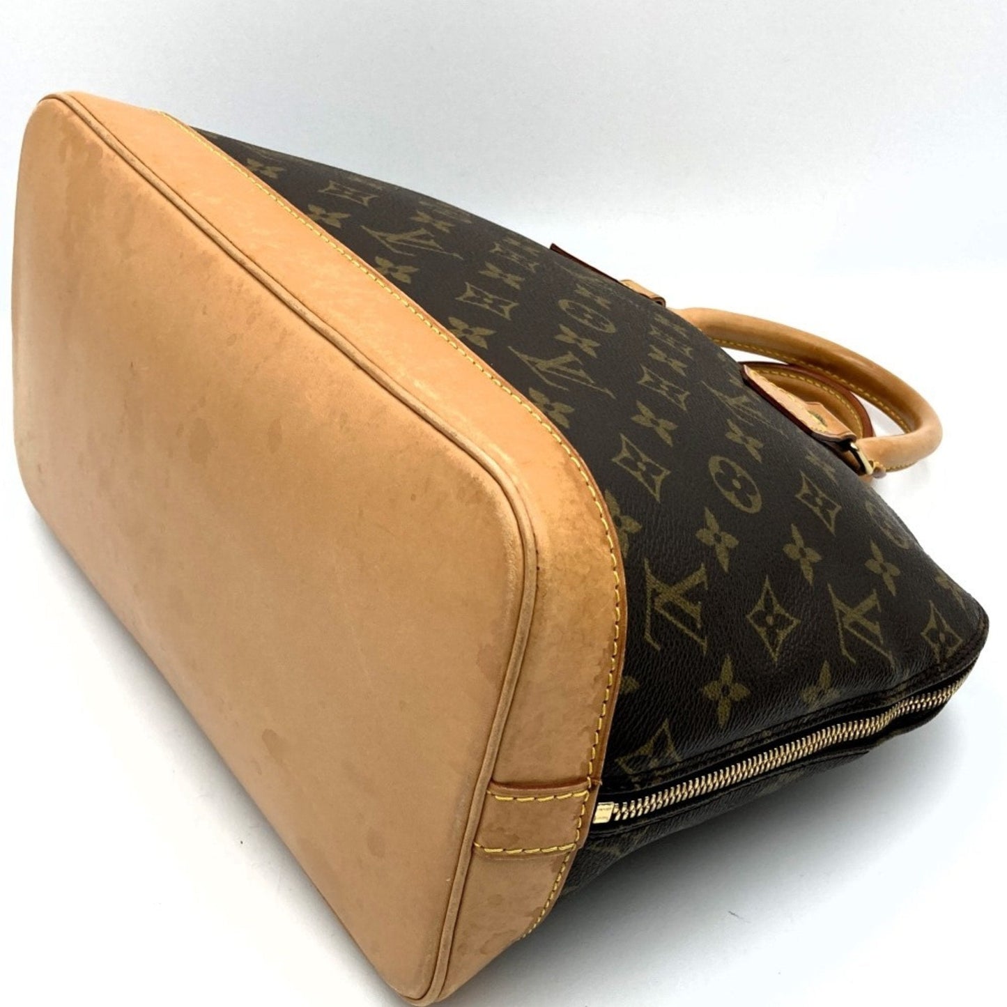 Louis Vuitton Alma Canvas Handbag ()