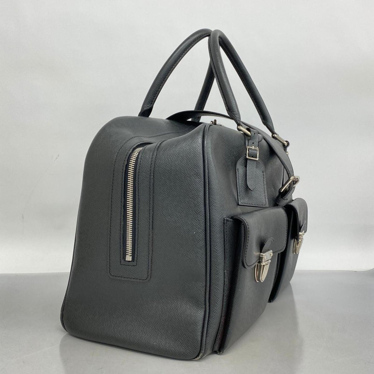 Louis Vuitton Weekend Leather Travel Bag ()