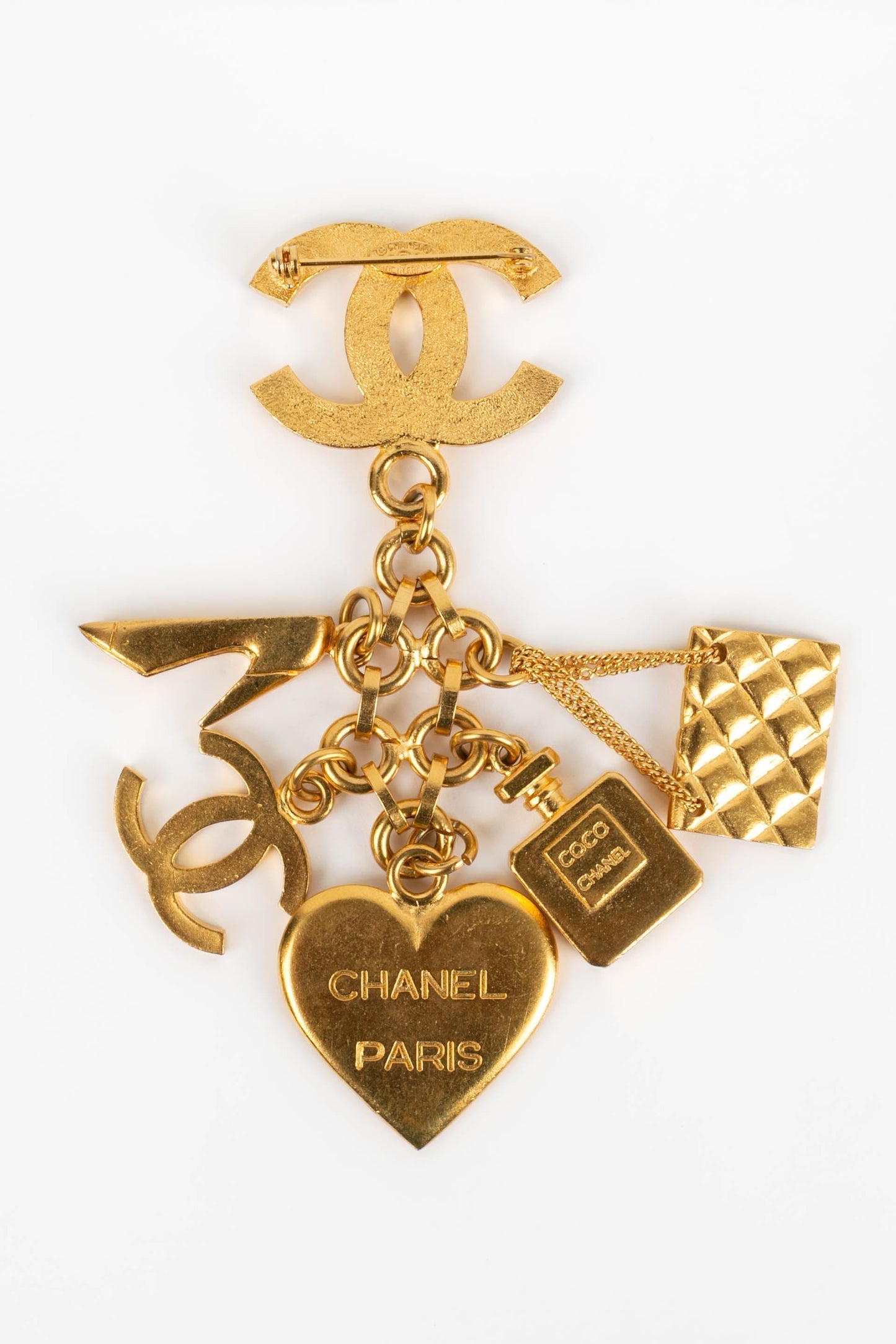 Broche charms Chanel 1995