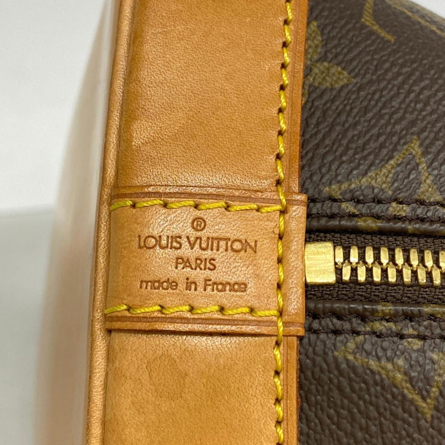 Louis Vuitton Alma Canvas Handbag ()