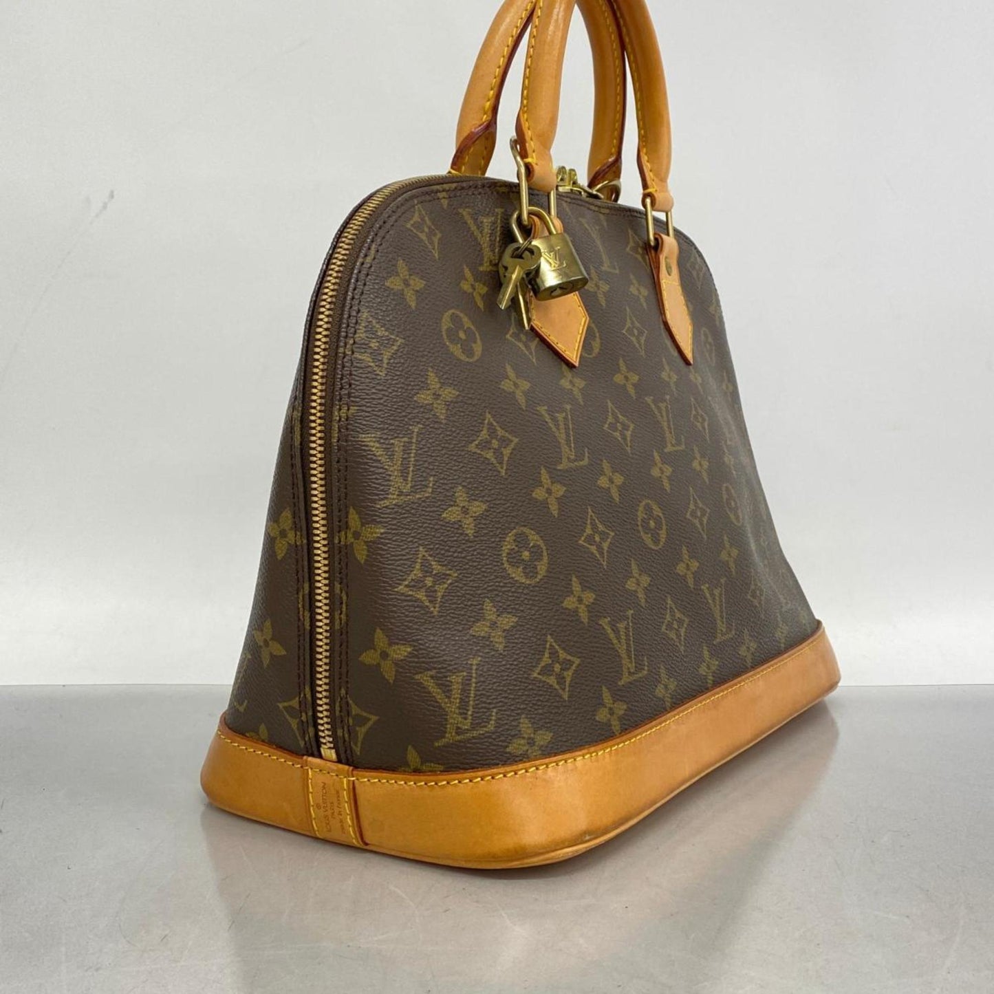 Louis Vuitton Alma Canvas Handbag ()