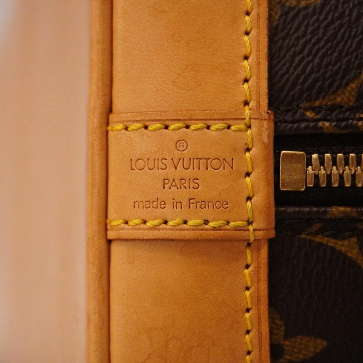 Louis Vuitton Alma Canvas Handbag ()