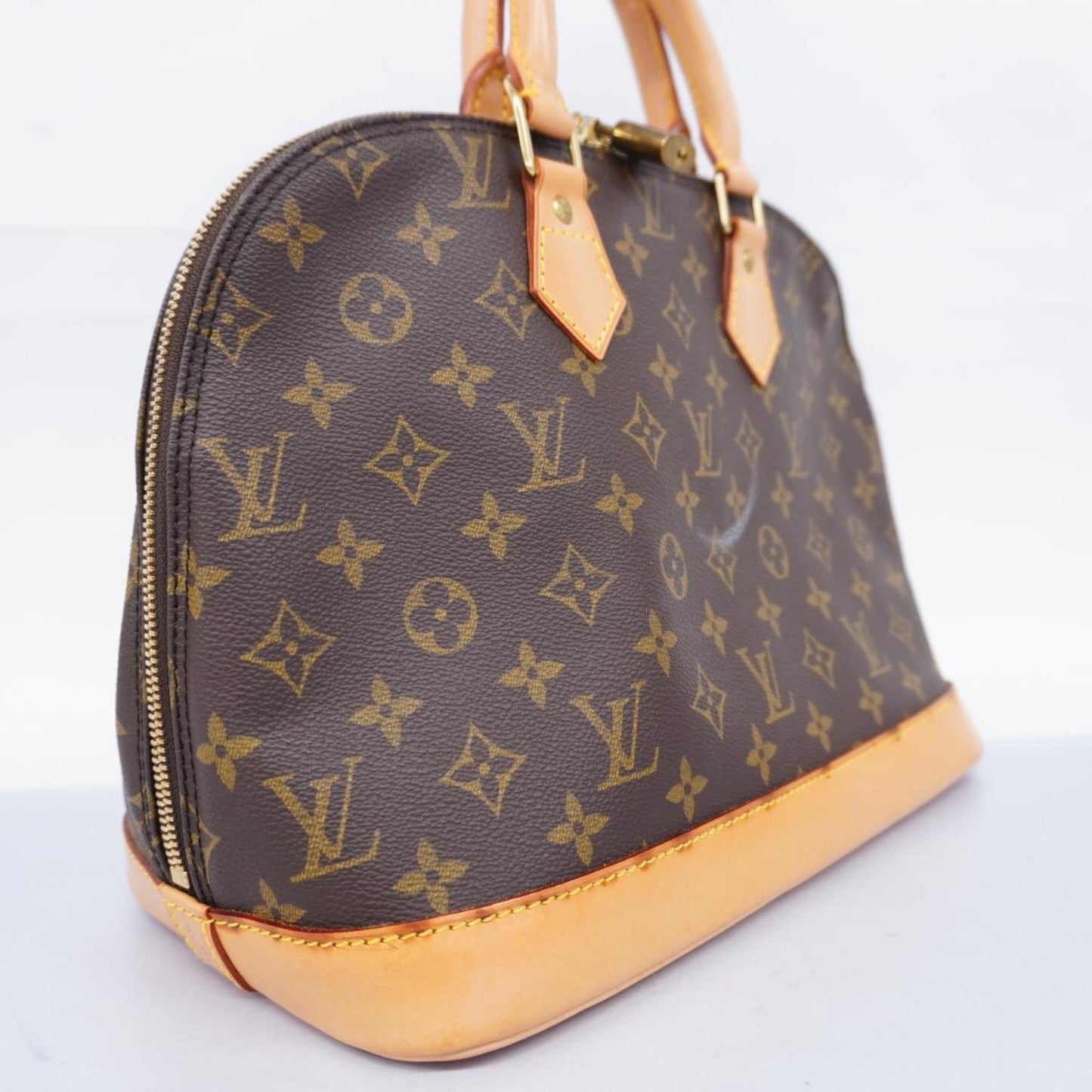 Louis Vuitton Alma  Canvas Handbag ()