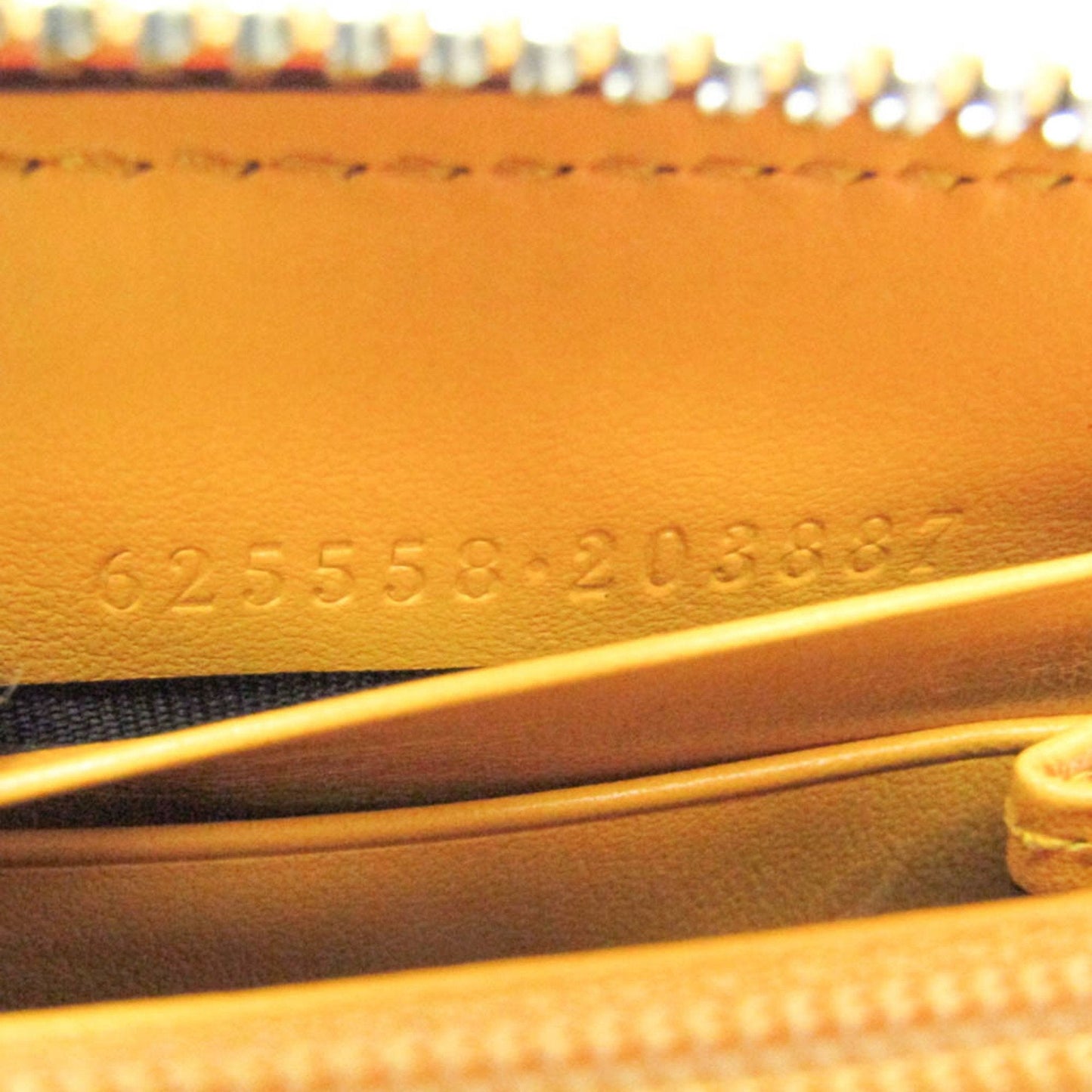 Gucci Gg Embossé Yellow Leather Wallet  ()