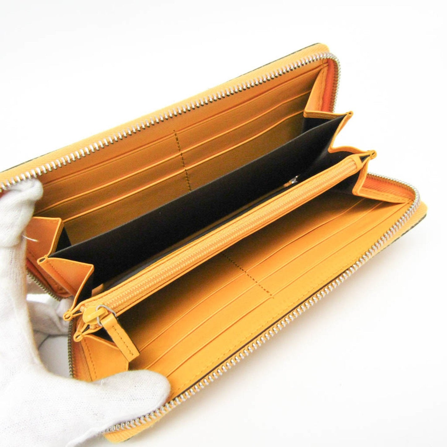 Gucci Gg Embossé Yellow Leather Wallet  ()