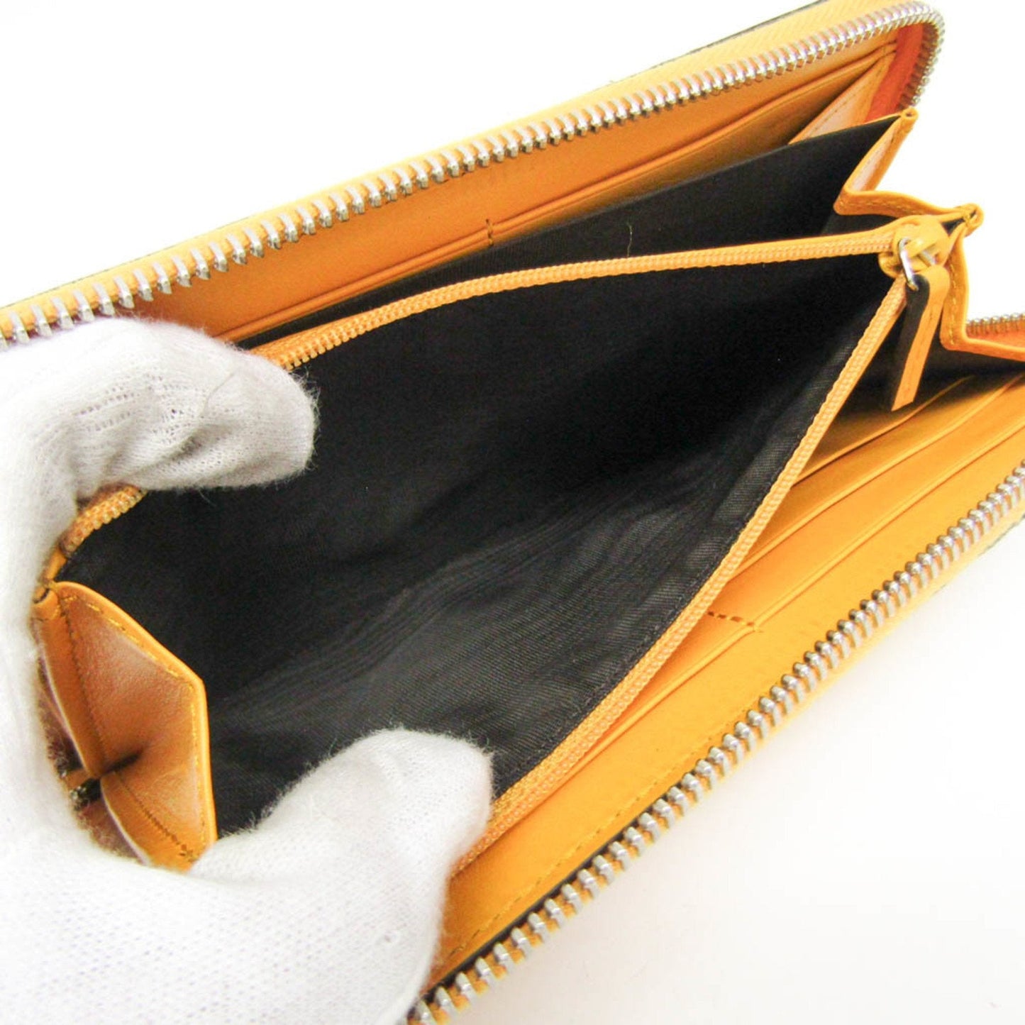 Gucci Gg Embossé Yellow Leather Wallet  ()