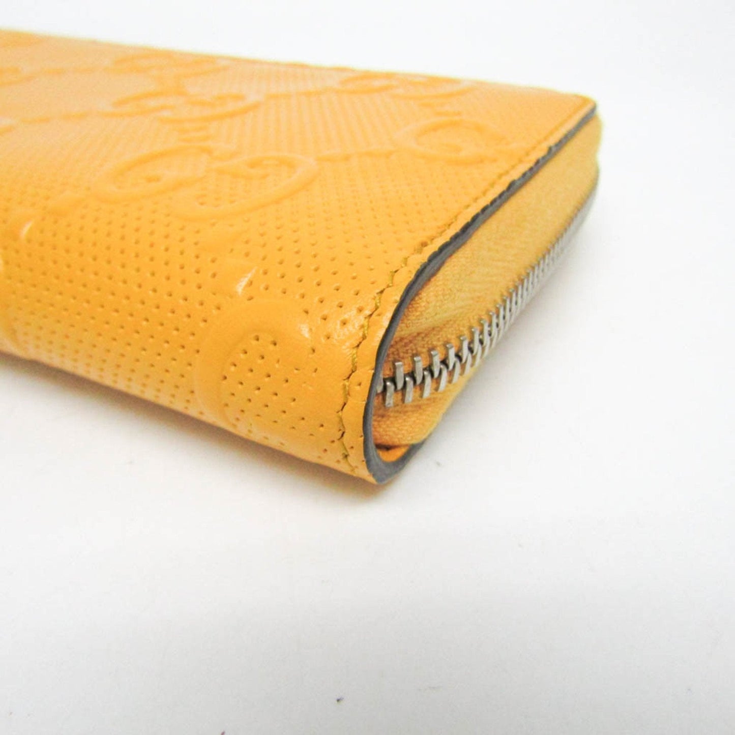 Gucci Gg Embossé Yellow Leather Wallet  ()