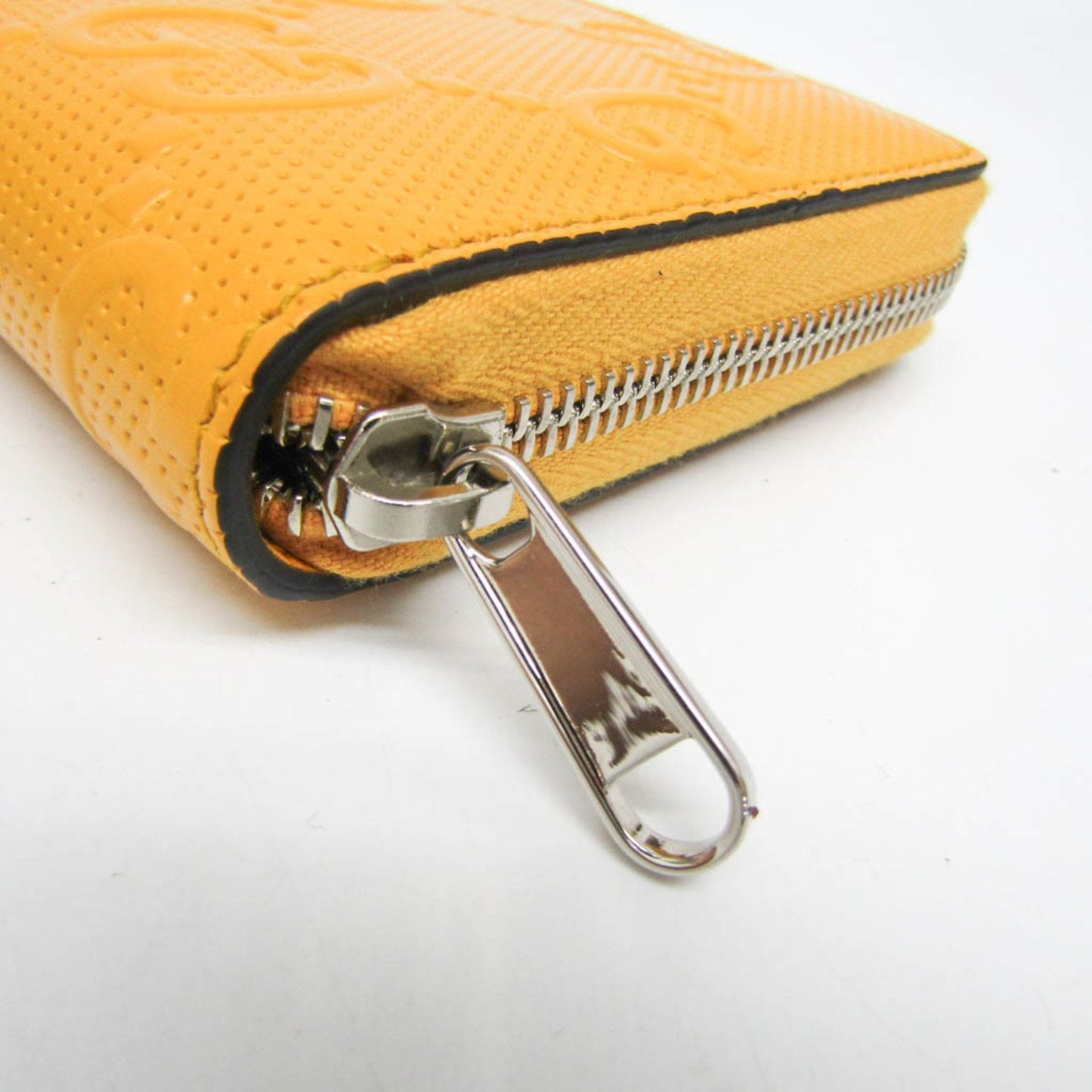 Gucci Gg Embossé Yellow Leather Wallet  ()