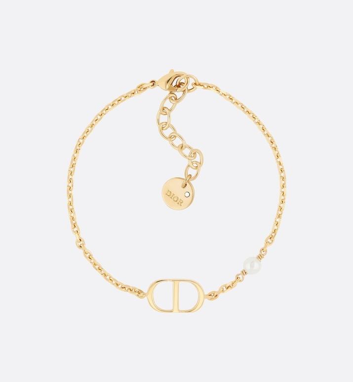 Petit CD Bracelet • Gold-Finish Metal with a White Resin Pearl