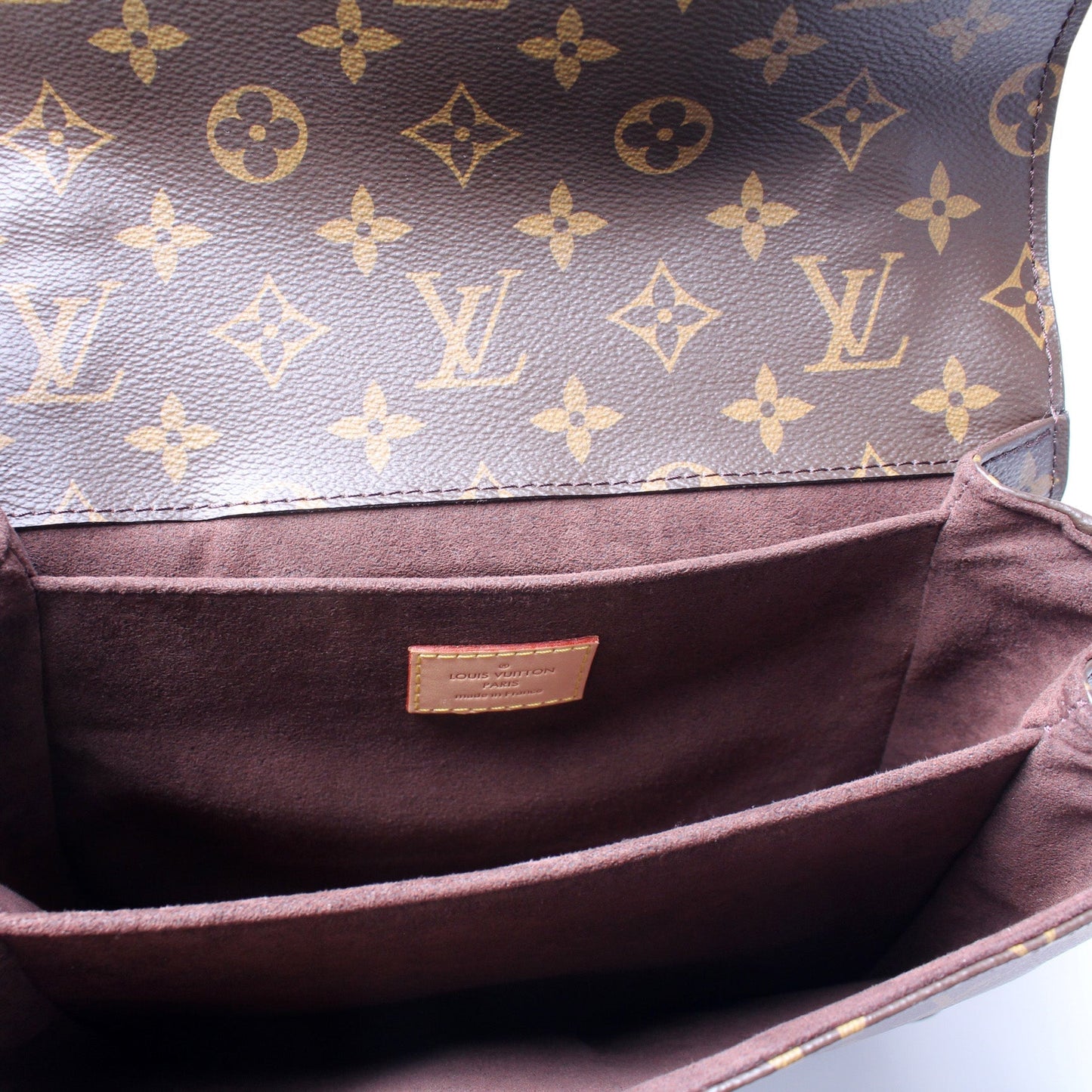 Pochette Metis Monogram