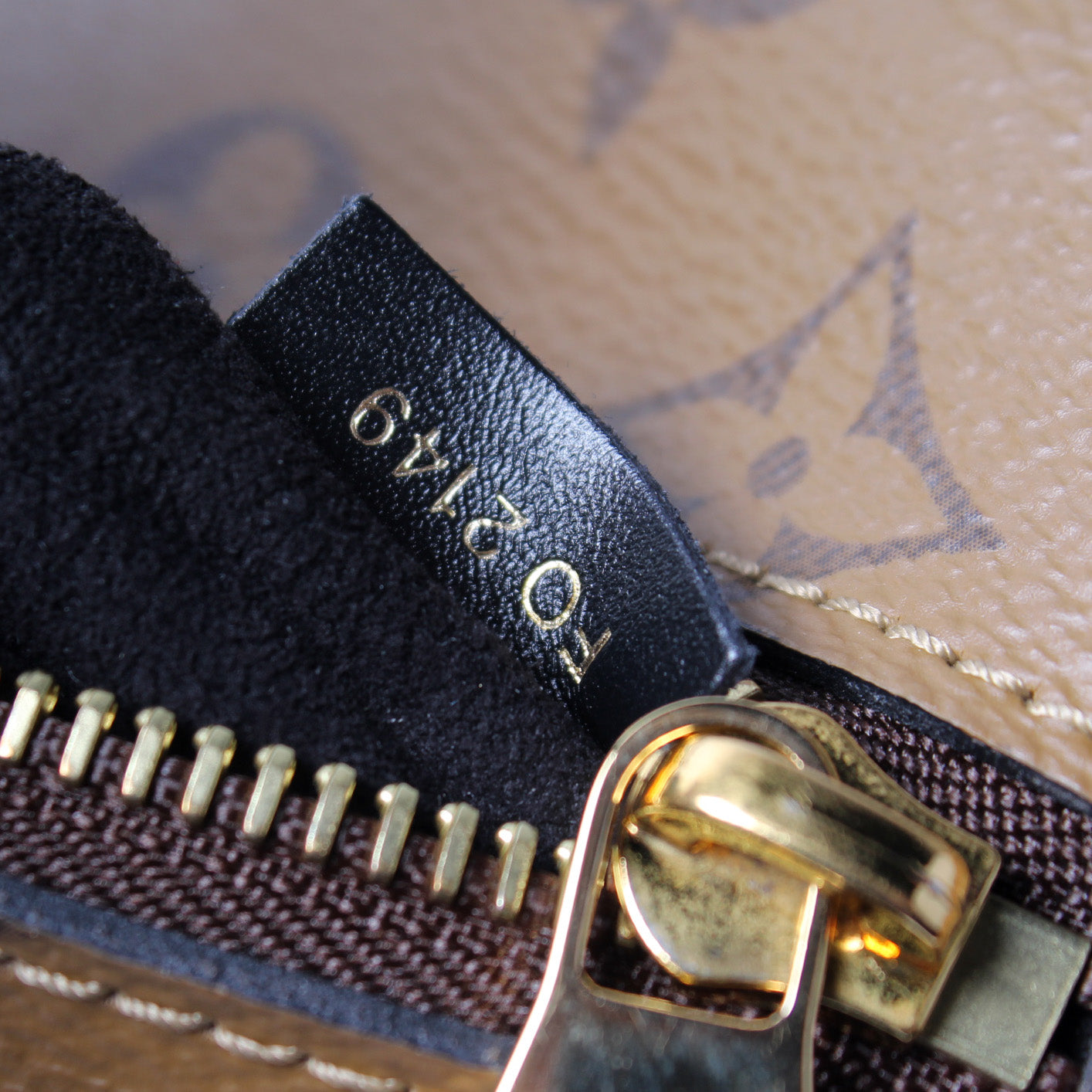 Pochette Metis Reverse Monogram