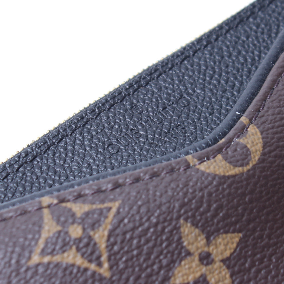 Pallas Clutch Monogram