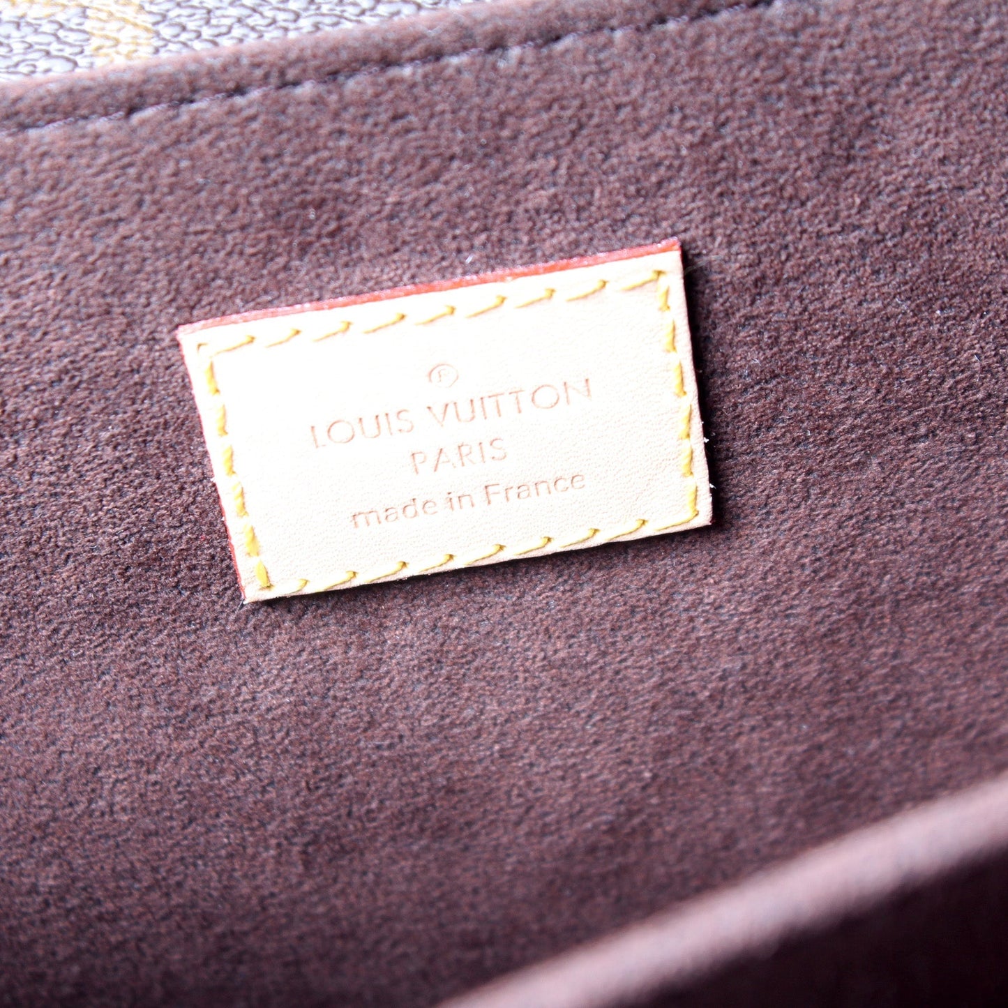 Pochette Metis Monogram