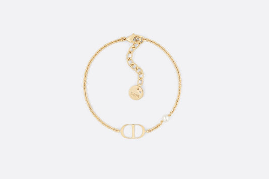 Petit CD Bracelet • Gold-Finish Metal with a White Resin Pearl