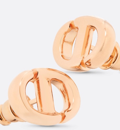 CD Navy Stud Earrings • Pink-finish metal