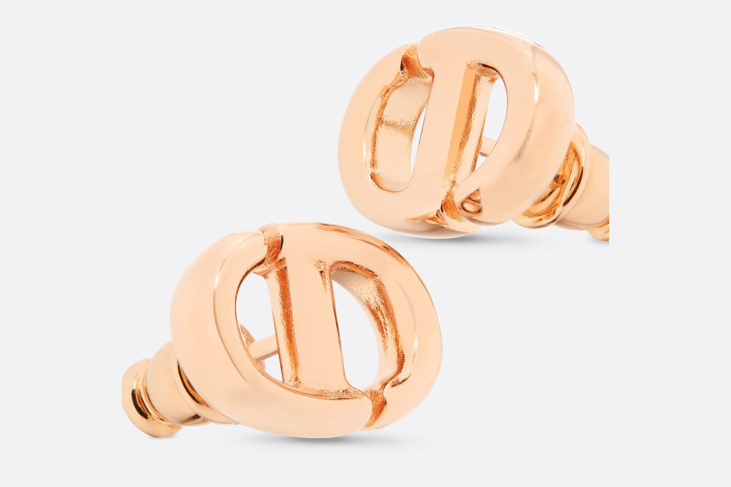 CD Navy Stud Earrings • Pink-finish metal