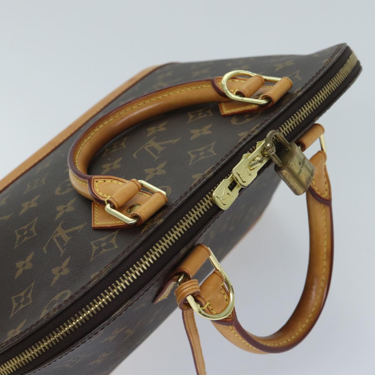 Louis Vuitton Alma  Canvas Handbag ()