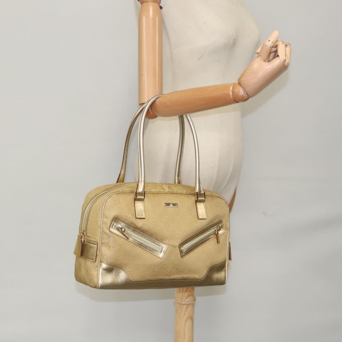 Gucci Gold Canvas Handbag ()