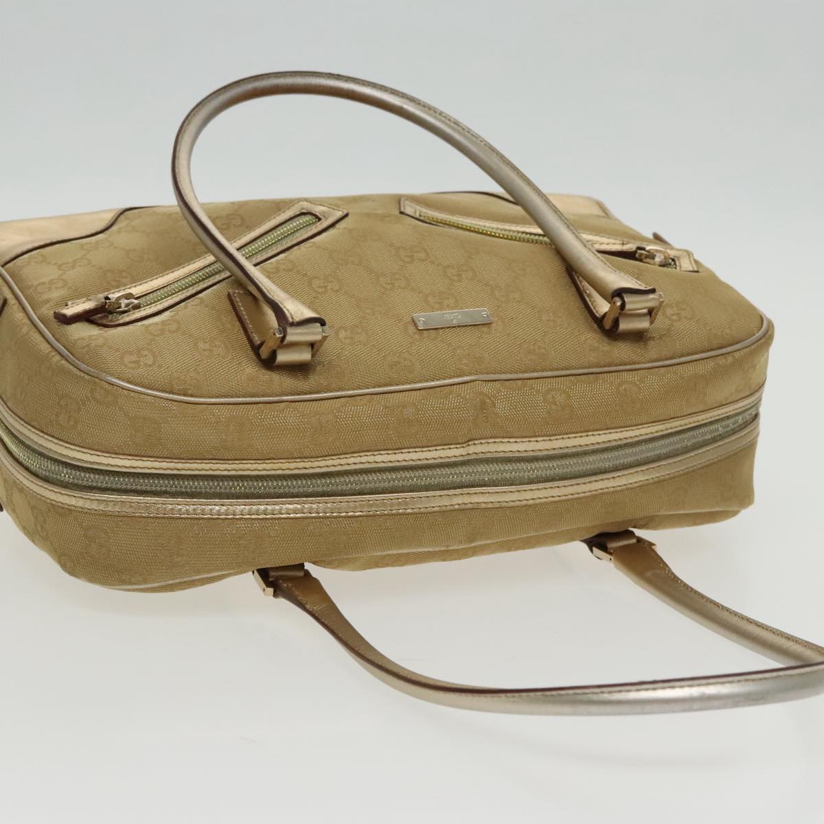 Gucci Gold Canvas Handbag ()