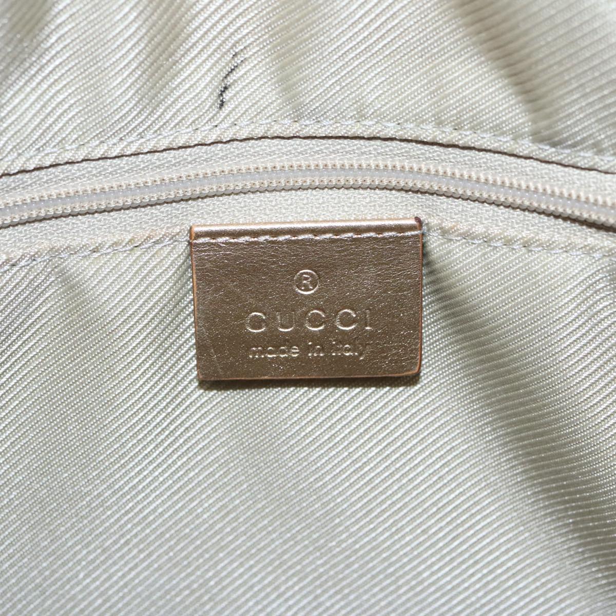 Gucci Gold Canvas Handbag ()