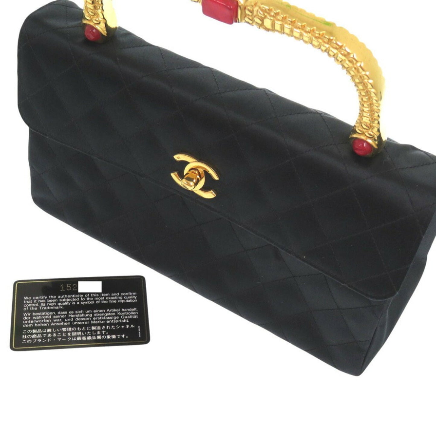 Chanel Black Satin Metal Handbag ()