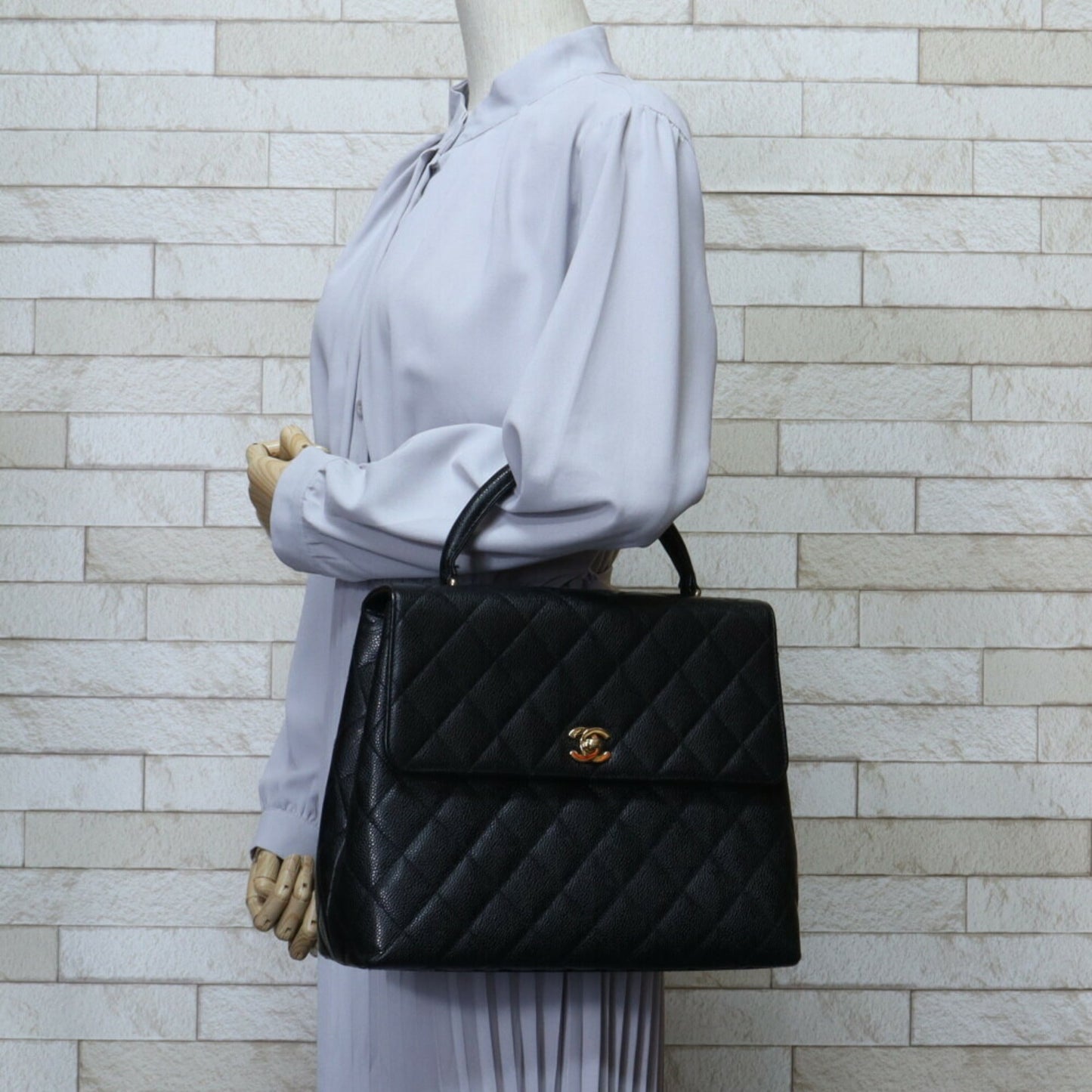Chanel Black Caviar Leather Handbag ()