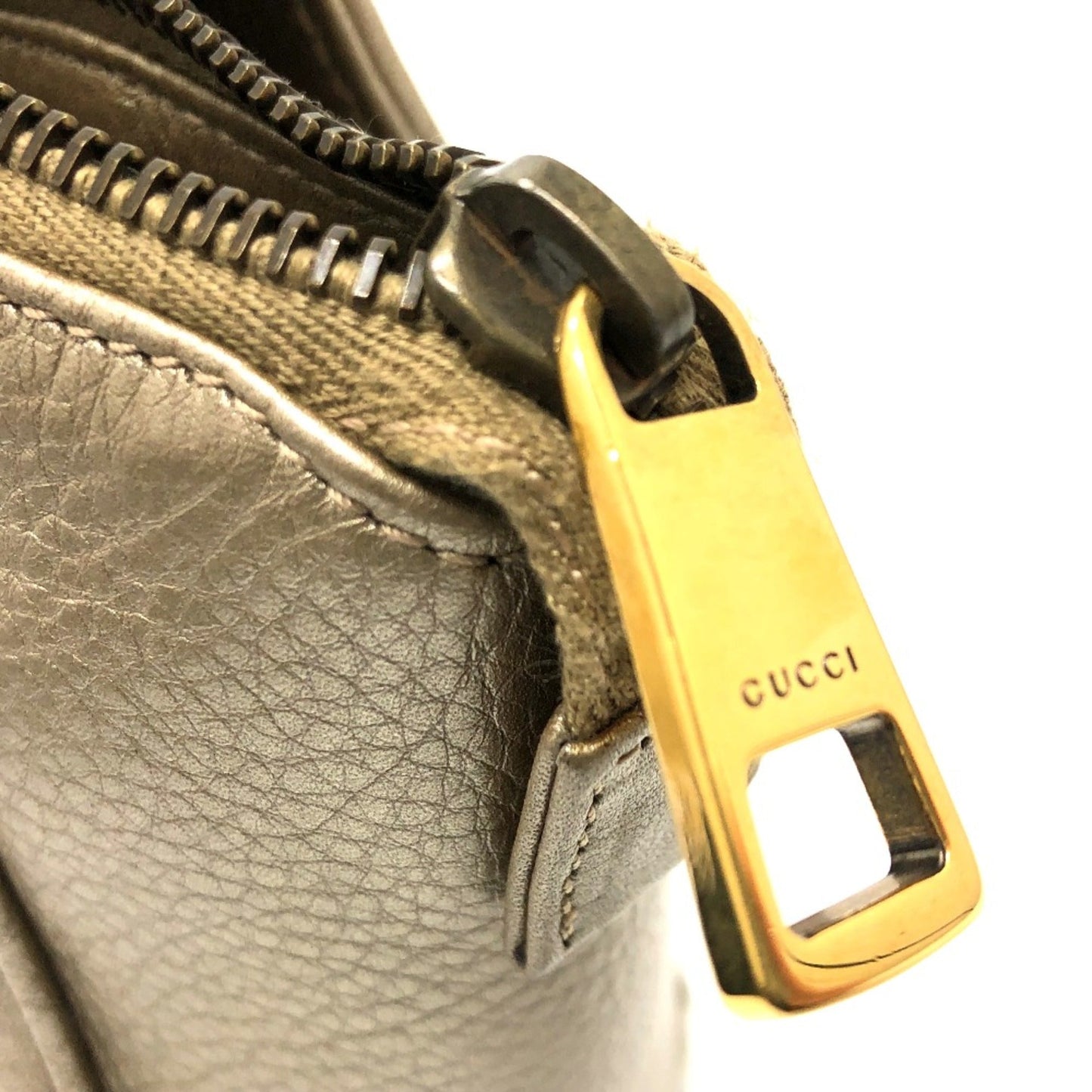 Gucci Gold Leather Handbag ()