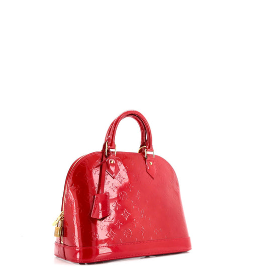 Alma Handbag Monogram Vernis PM
