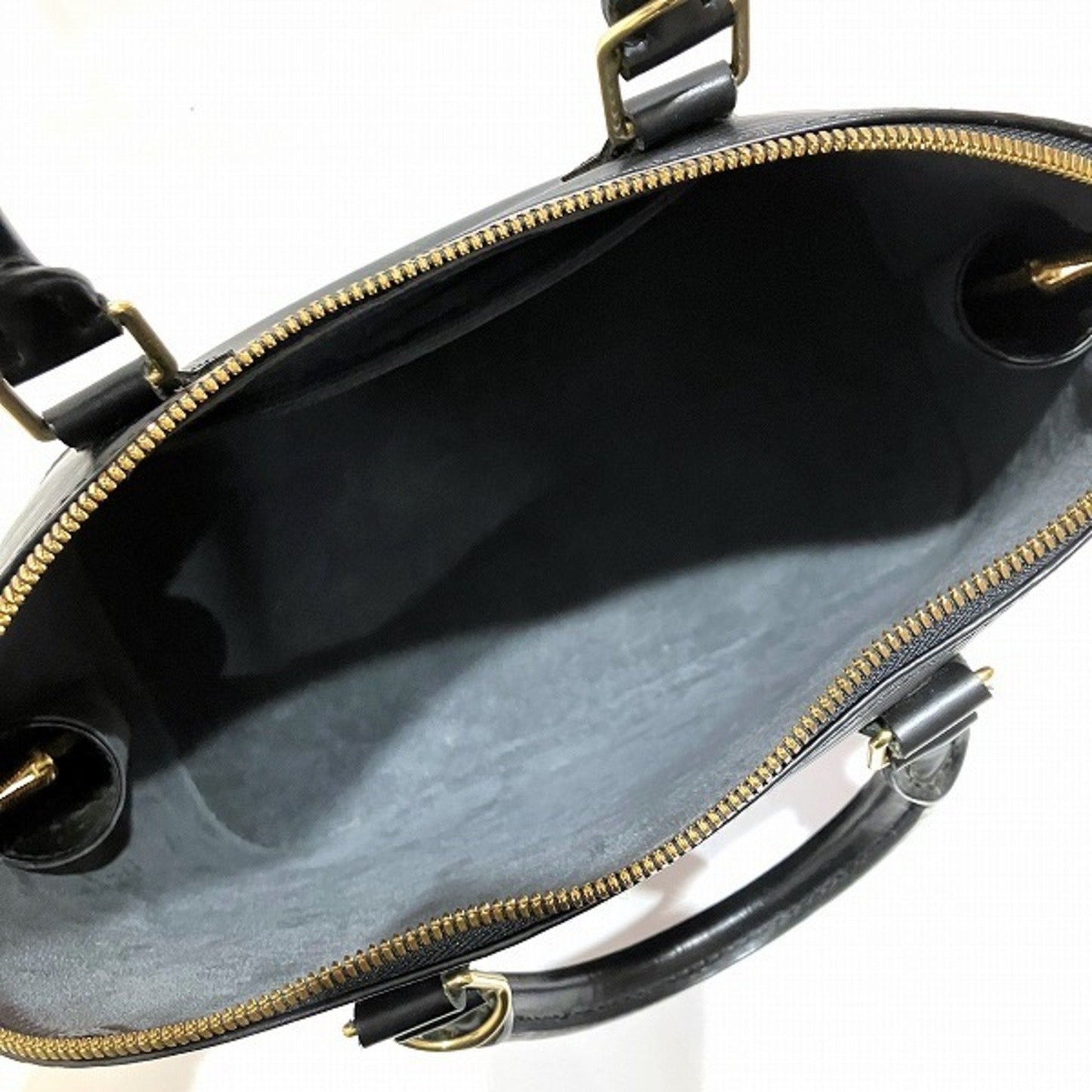 Louis Vuitton Alma  Leather Handbag ()