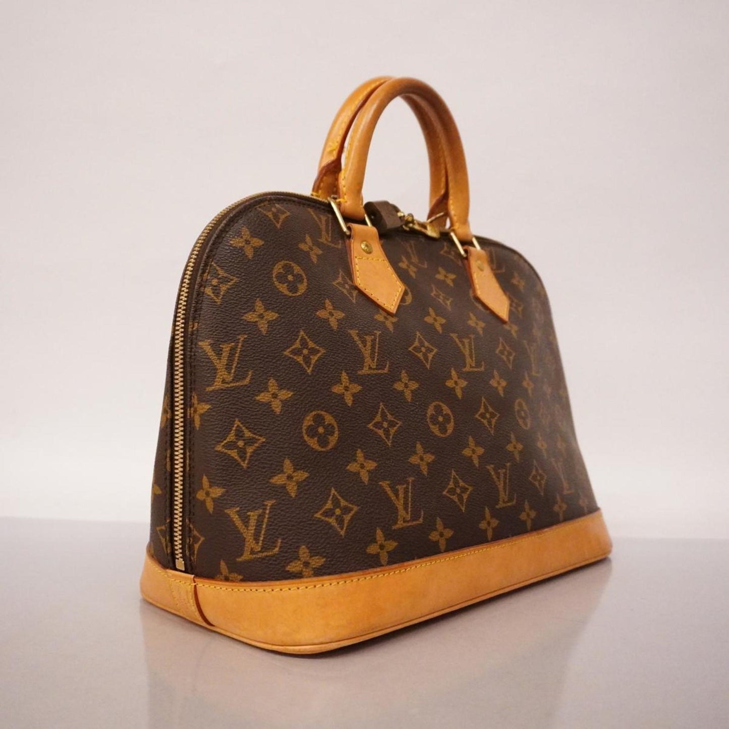 Louis Vuitton Alma  Canvas Handbag ()