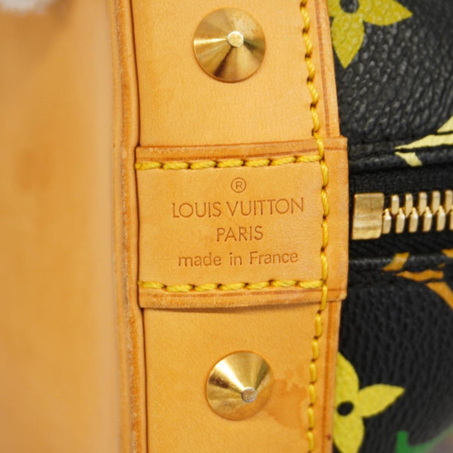 Louis Vuitton Alma  Canvas Handbag ()
