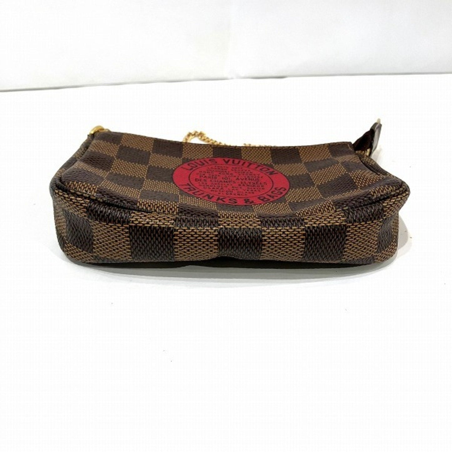 Louis Vuitton Mini Pochette Accessoires  Canvas Clutch Bag ()