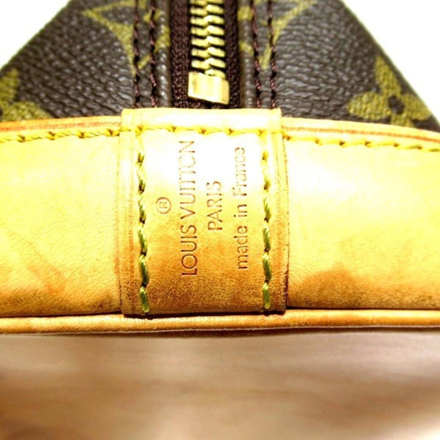 Louis Vuitton Alma  Canvas Handbag ()