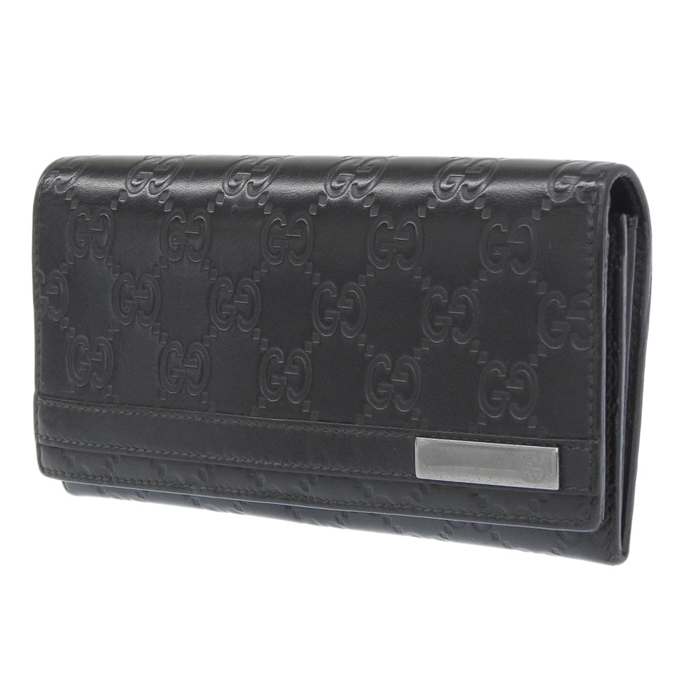 Gucci -- Black Leather Wallet  ()