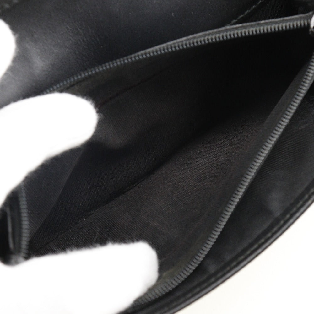 Gucci -- Black Leather Wallet  ()