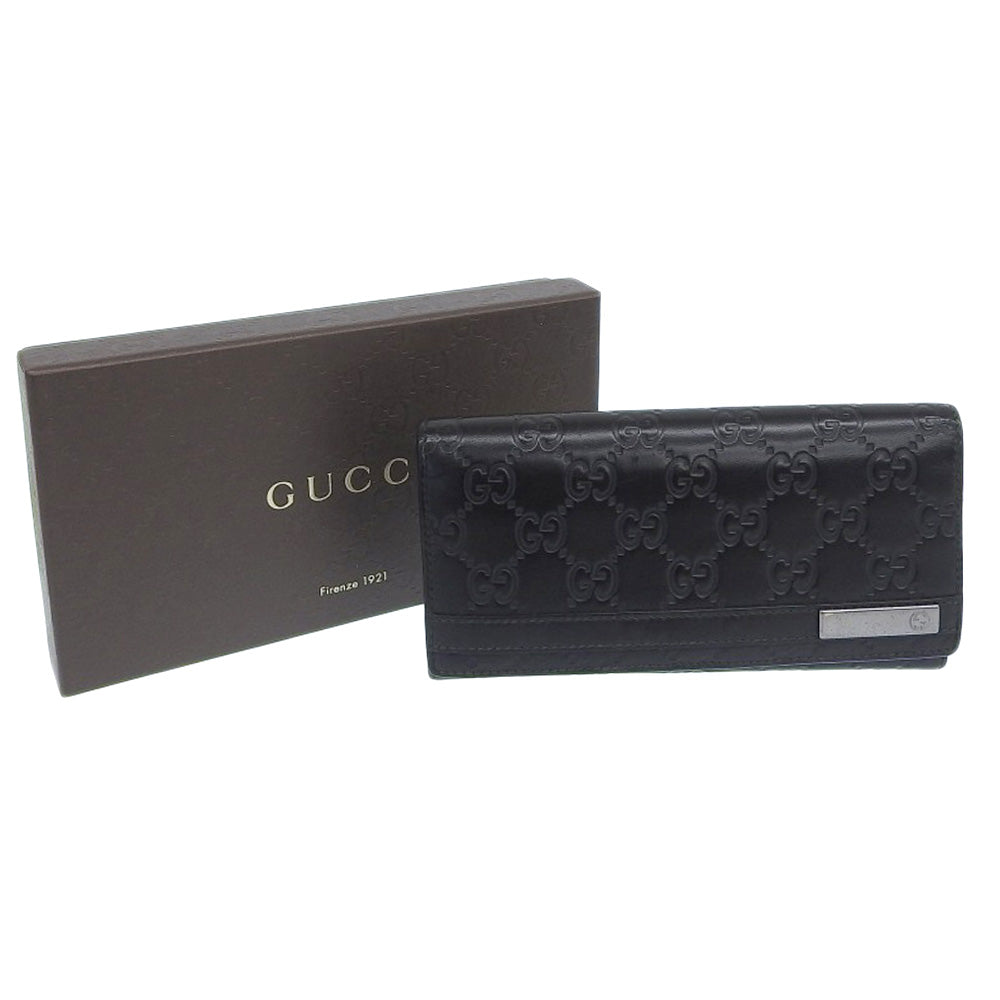 Gucci -- Black Leather Wallet  ()
