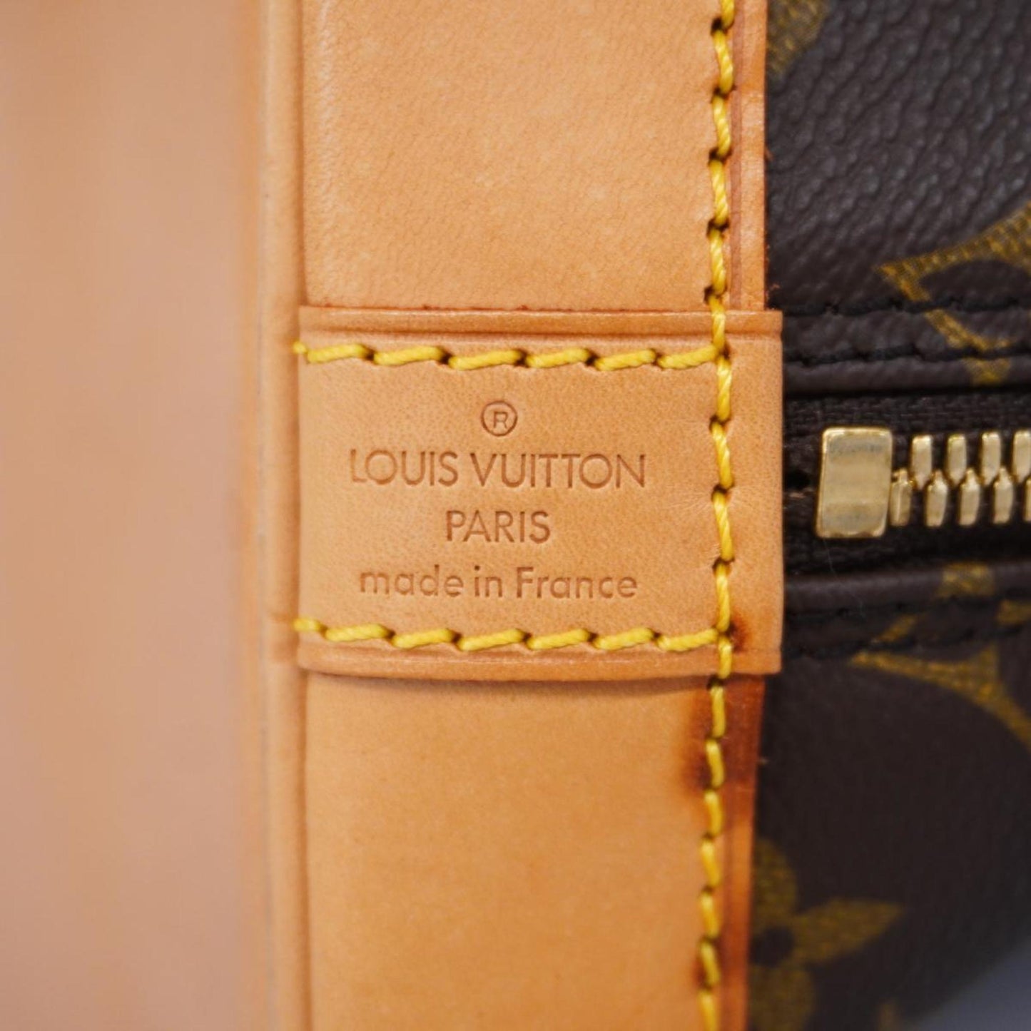 Louis Vuitton Alma  Canvas Handbag ()