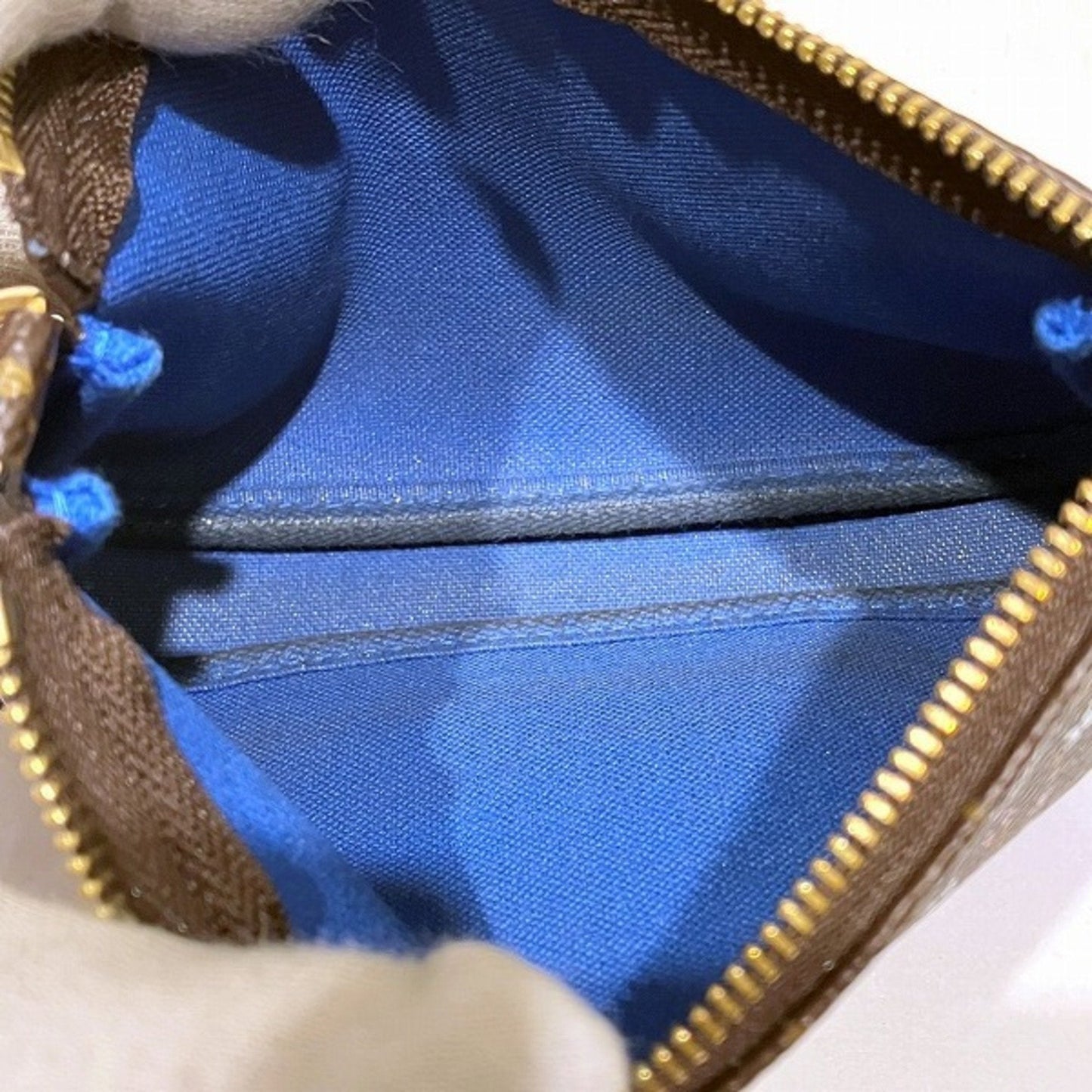 Louis Vuitton Mini Pochette Accessoires  Canvas Clutch Bag ()