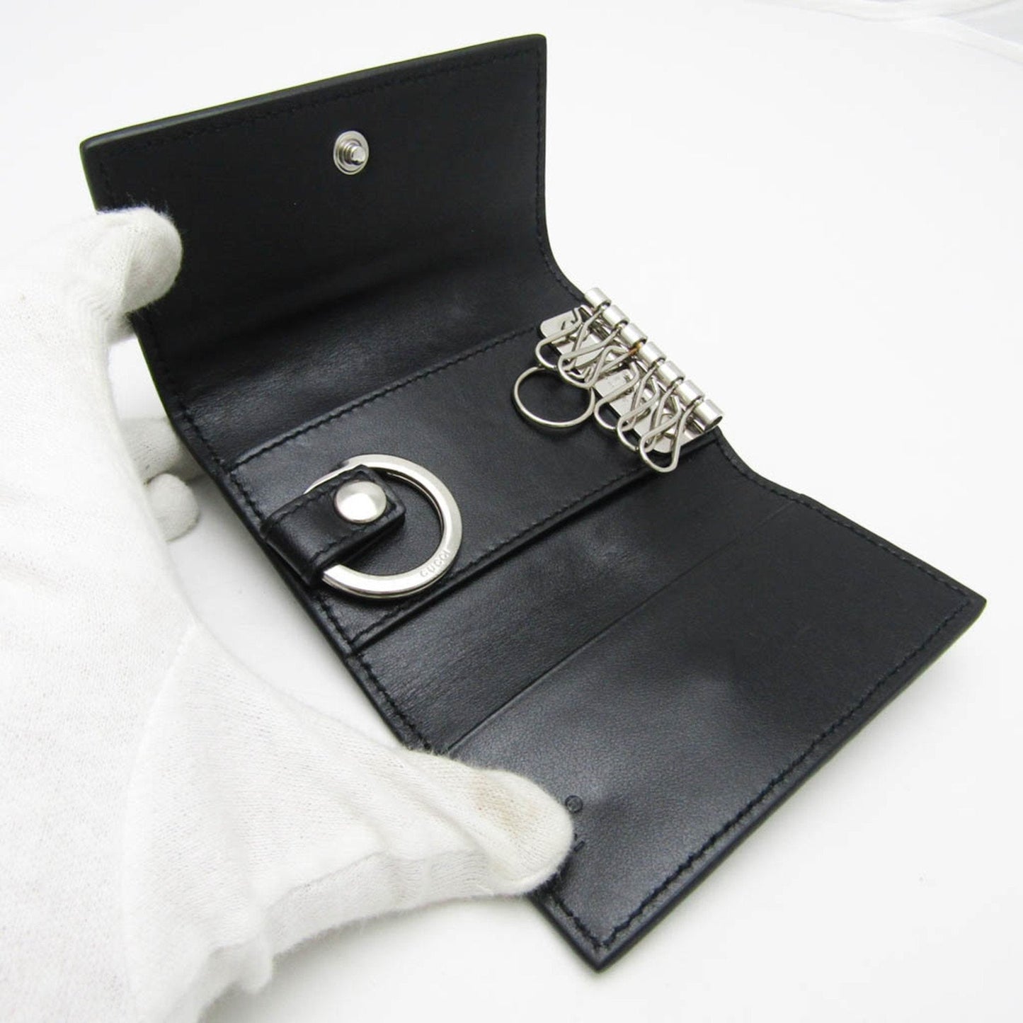 Gucci Gg Embossé Black Leather Wallet  ()