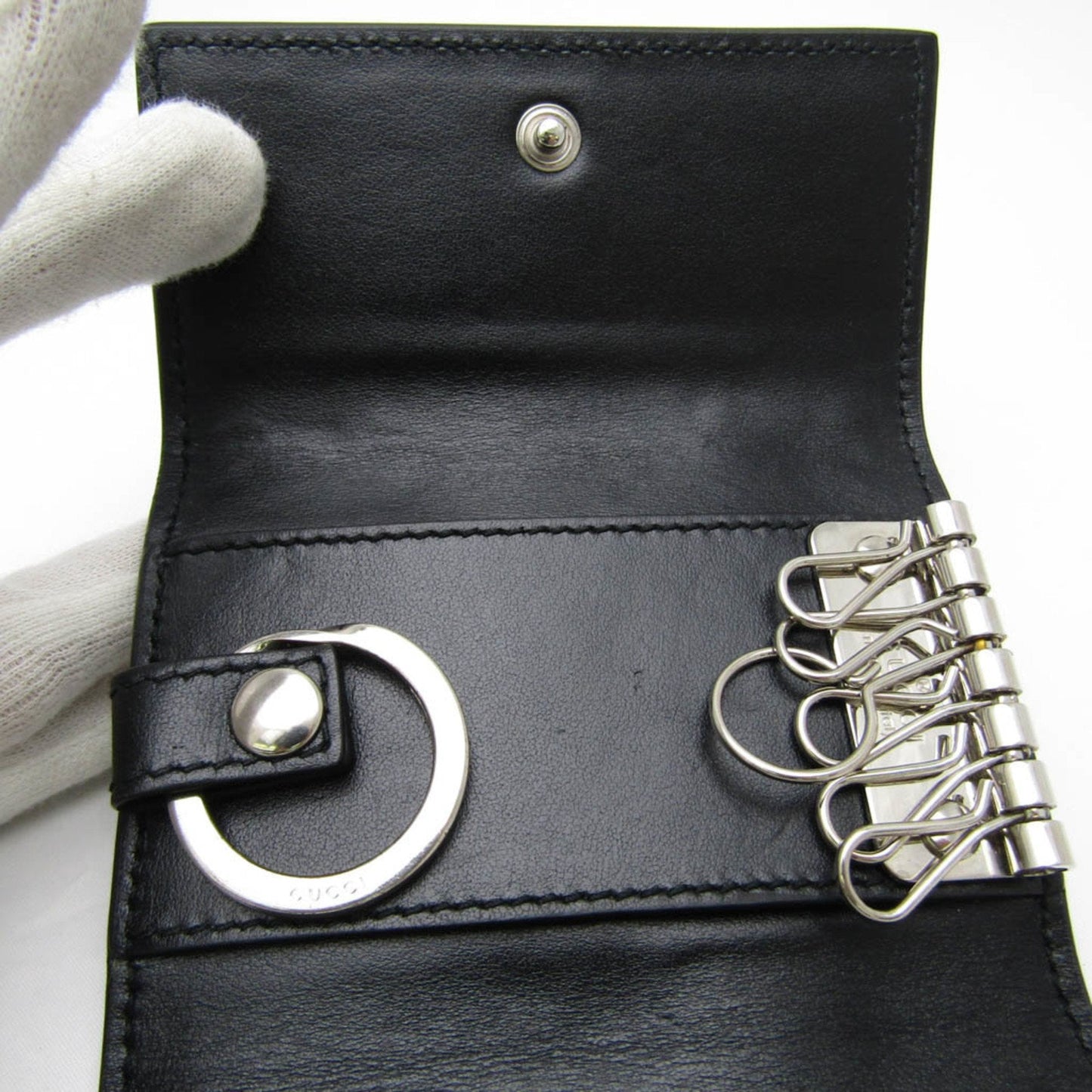 Gucci Gg Embossé Black Leather Wallet  ()