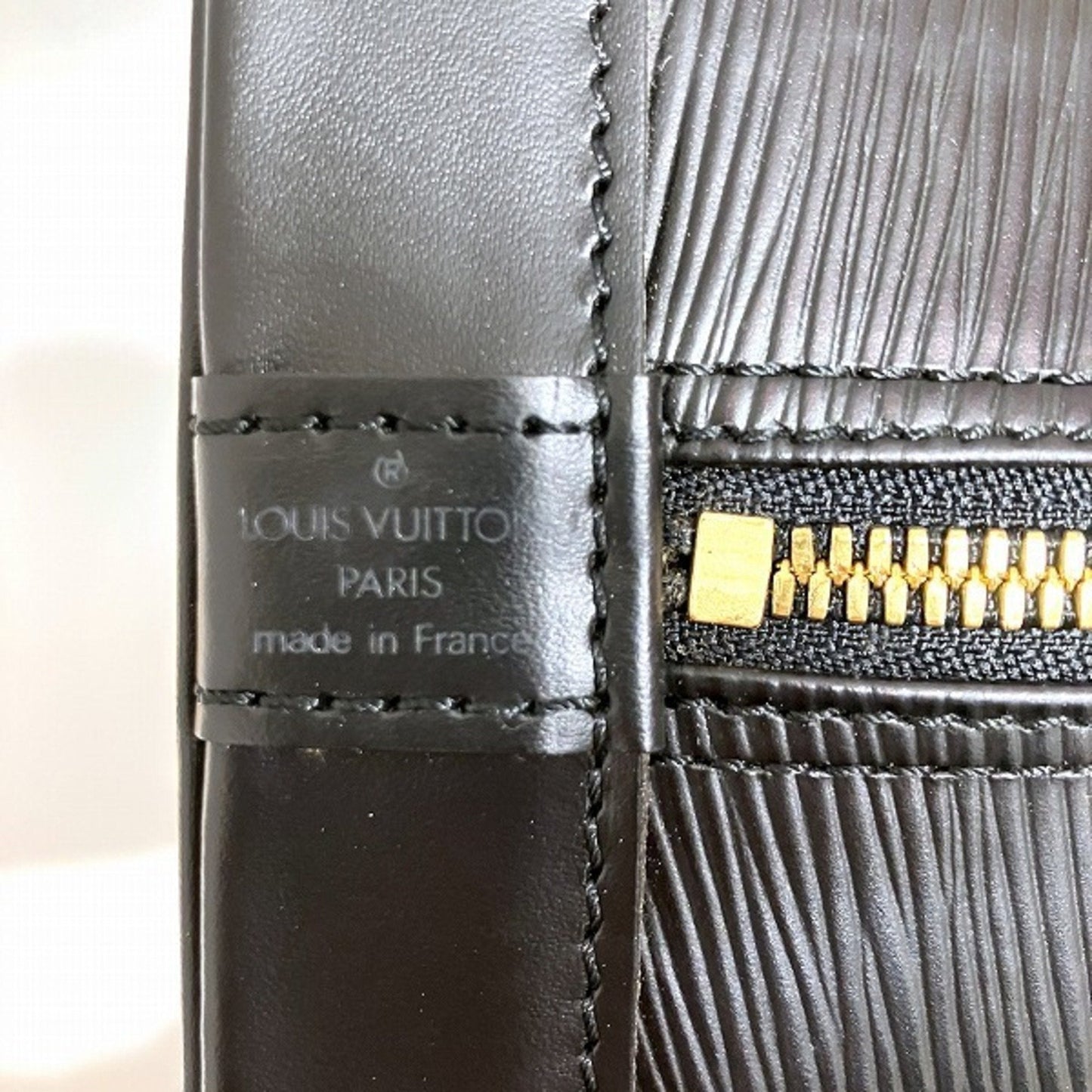 Louis Vuitton Alma  Leather Handbag ()