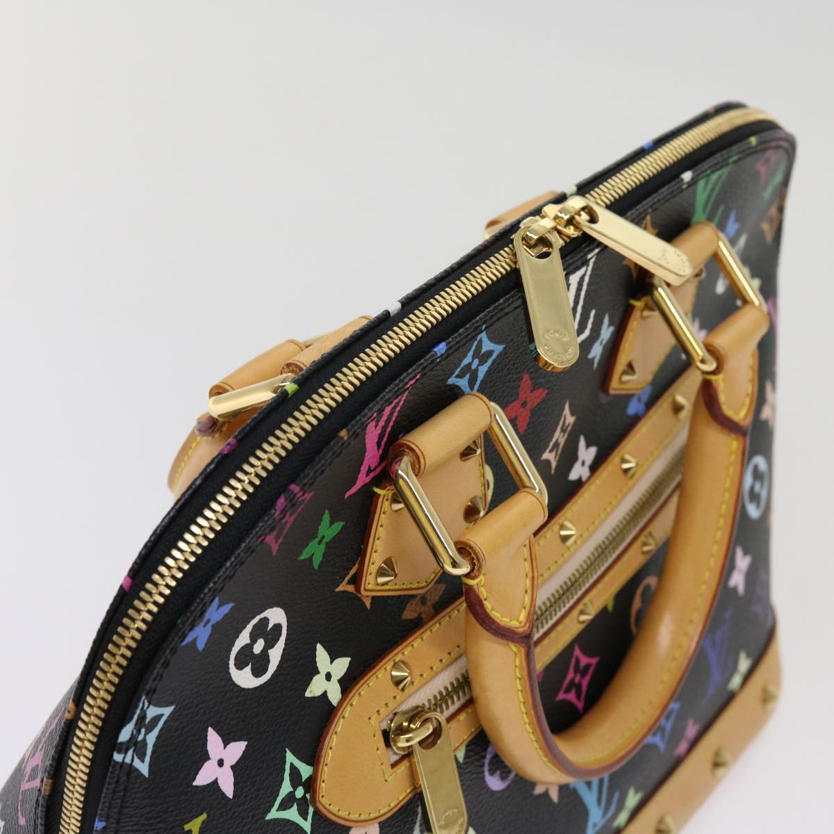 Louis Vuitton Alma  Canvas Handbag ()