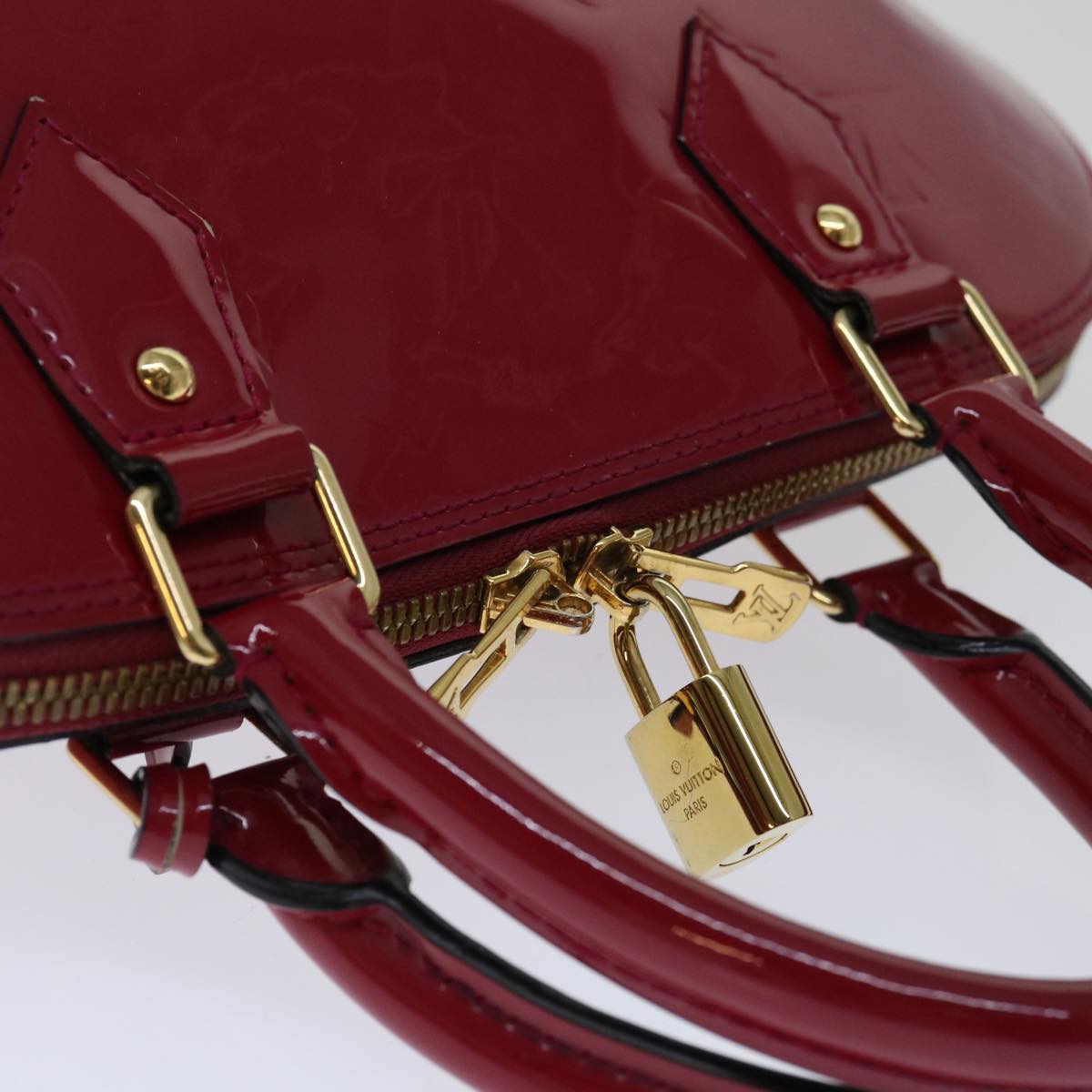 Louis Vuitton Alma  Patent Leather Handbag ()