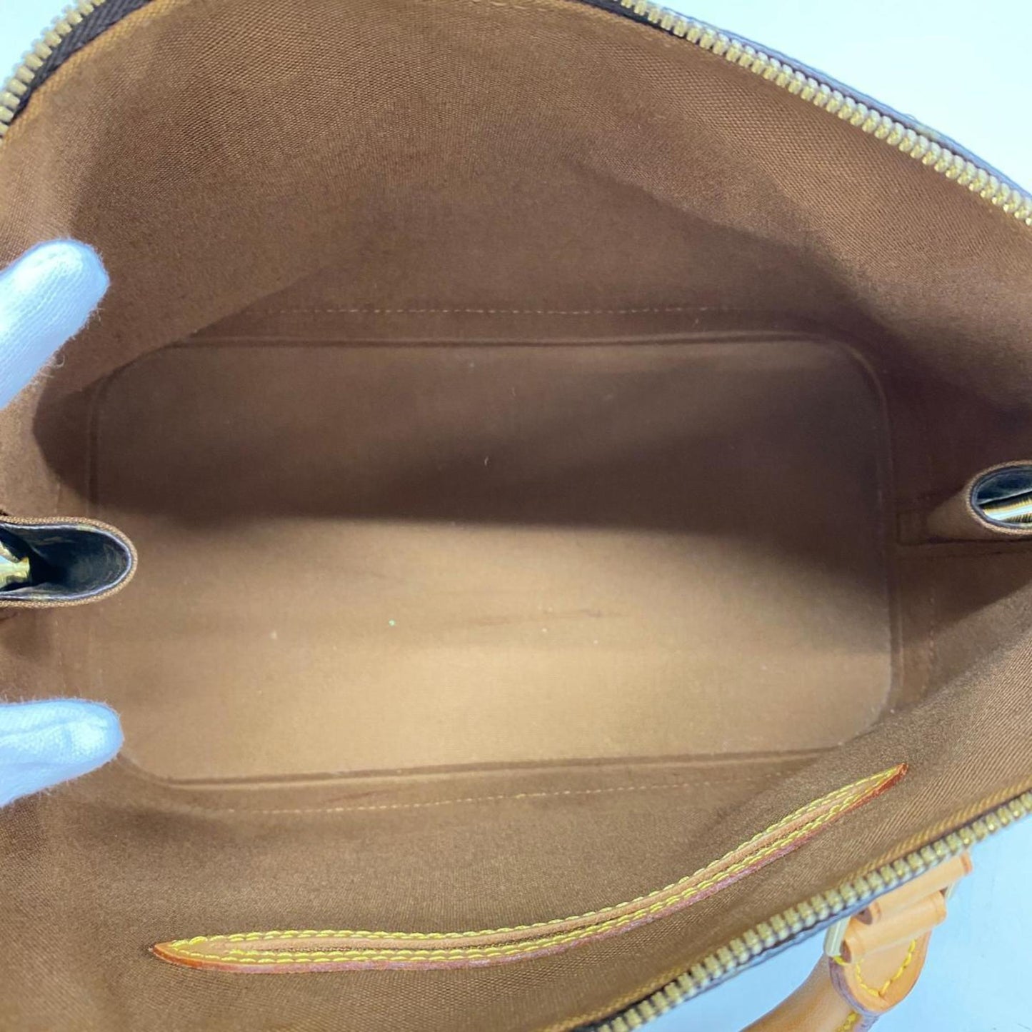 Louis Vuitton Alma  Canvas Handbag ()