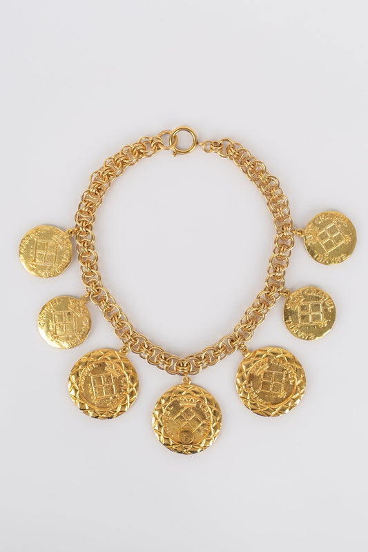 Collier doré Chanel