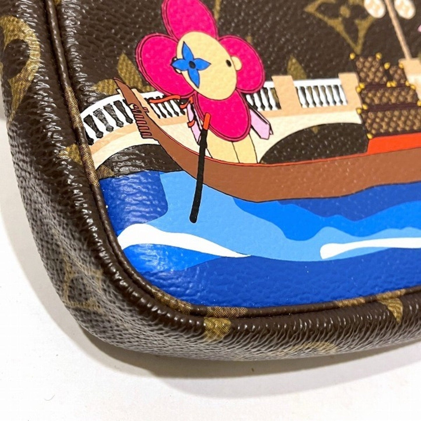Louis Vuitton Mini Pochette Accessoires  Canvas Clutch Bag ()