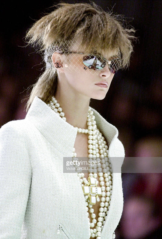 Collier croix Chanel