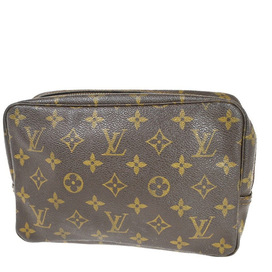 Louis Vuitton Trousse De Toilette  Canvas Clutch Bag ()