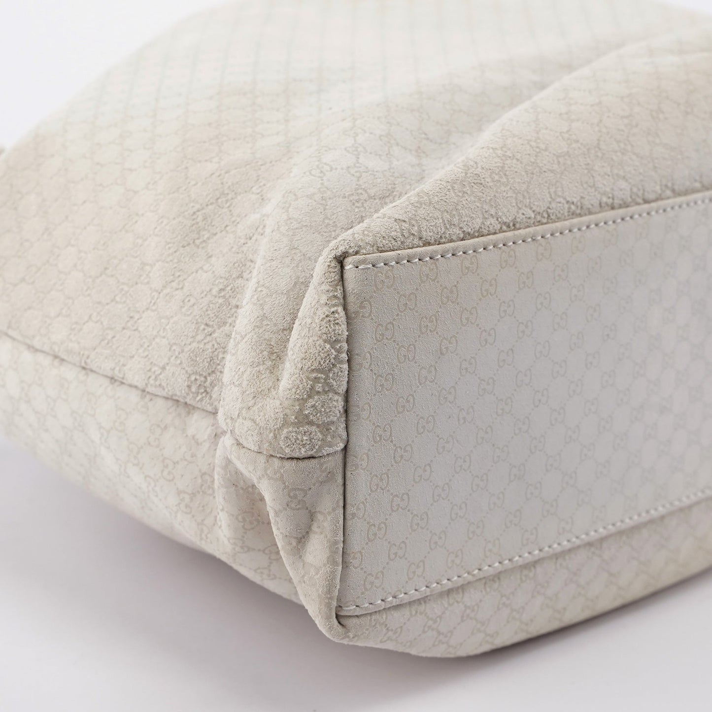 Beige Perforated Leather Drawstring Bag