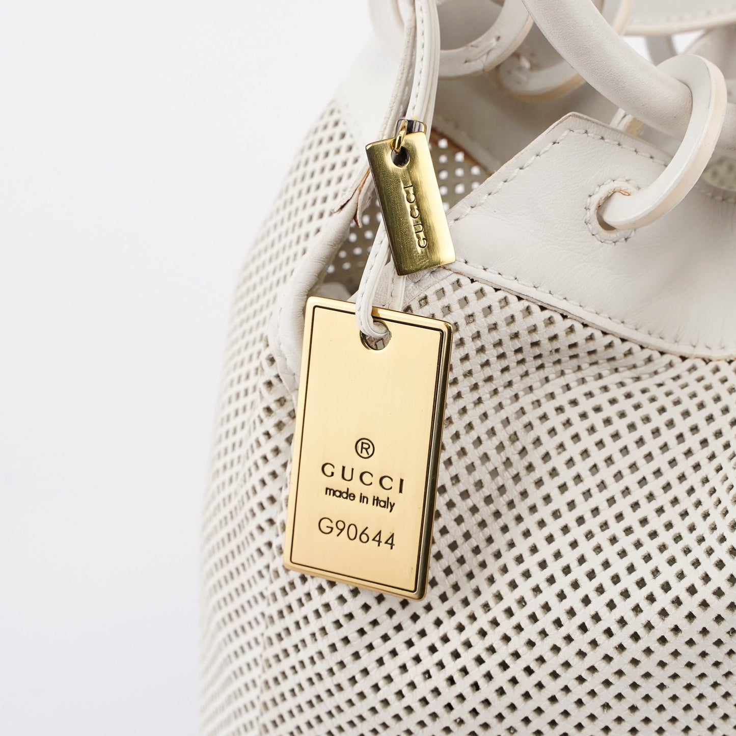 Beige Perforated Leather Drawstring Bag